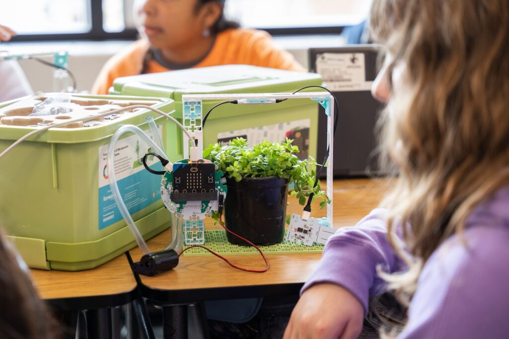 Students working on the micro:bit Smart Farming project from the Climate Action Kit