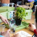 Students working on the micro:bit Smart Farming project from the Climate Action Kit