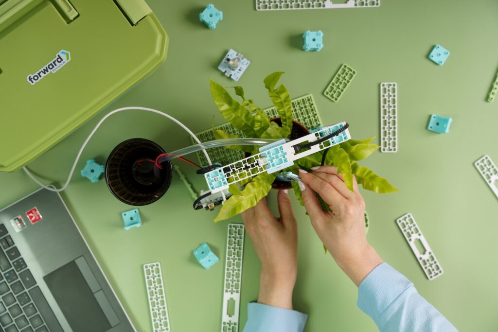 Top down shot of someone working on the Smart Farming micro:bit project from the Climate Action Kit