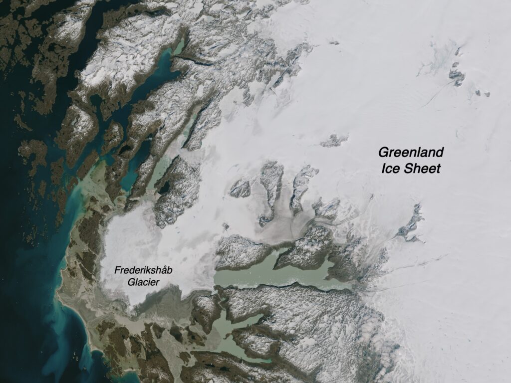 Image of Greenland Ice Sheet and the Frederikshab Glacier reflecting sunlight into space.