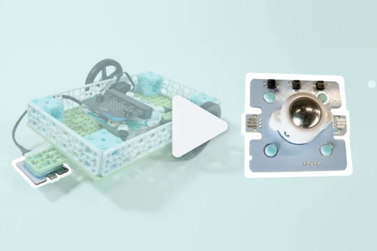 A highlighted line following sensor on a vehicle project beside an enlarged line following sensor with a large video play button in the centre.