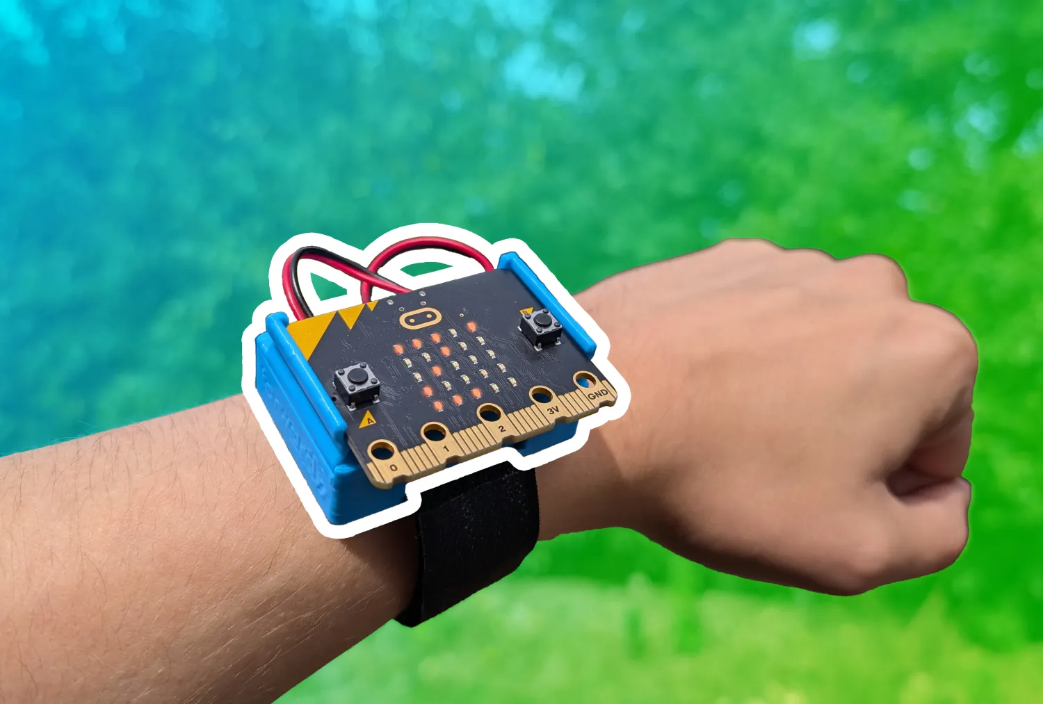 CHARGE for micro:bit attached to a wrist displaying 2 degrees. A blue to green gradient is overlaid behind the micro:bit which has a white boarder around it.