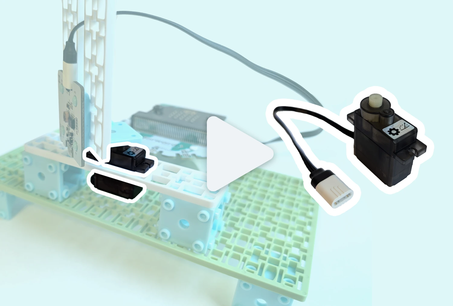 Highlighted positional servo in a solar panel project with a large video play button in the centre.