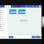 Screenshot of a video tutorial within the course. In the screenshot, our facilitator is walking through the MakeCode editor's interface.