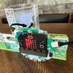 An NTU sensor setup with a cloudy glass of water positioned between the LED ring and the solar sensor.